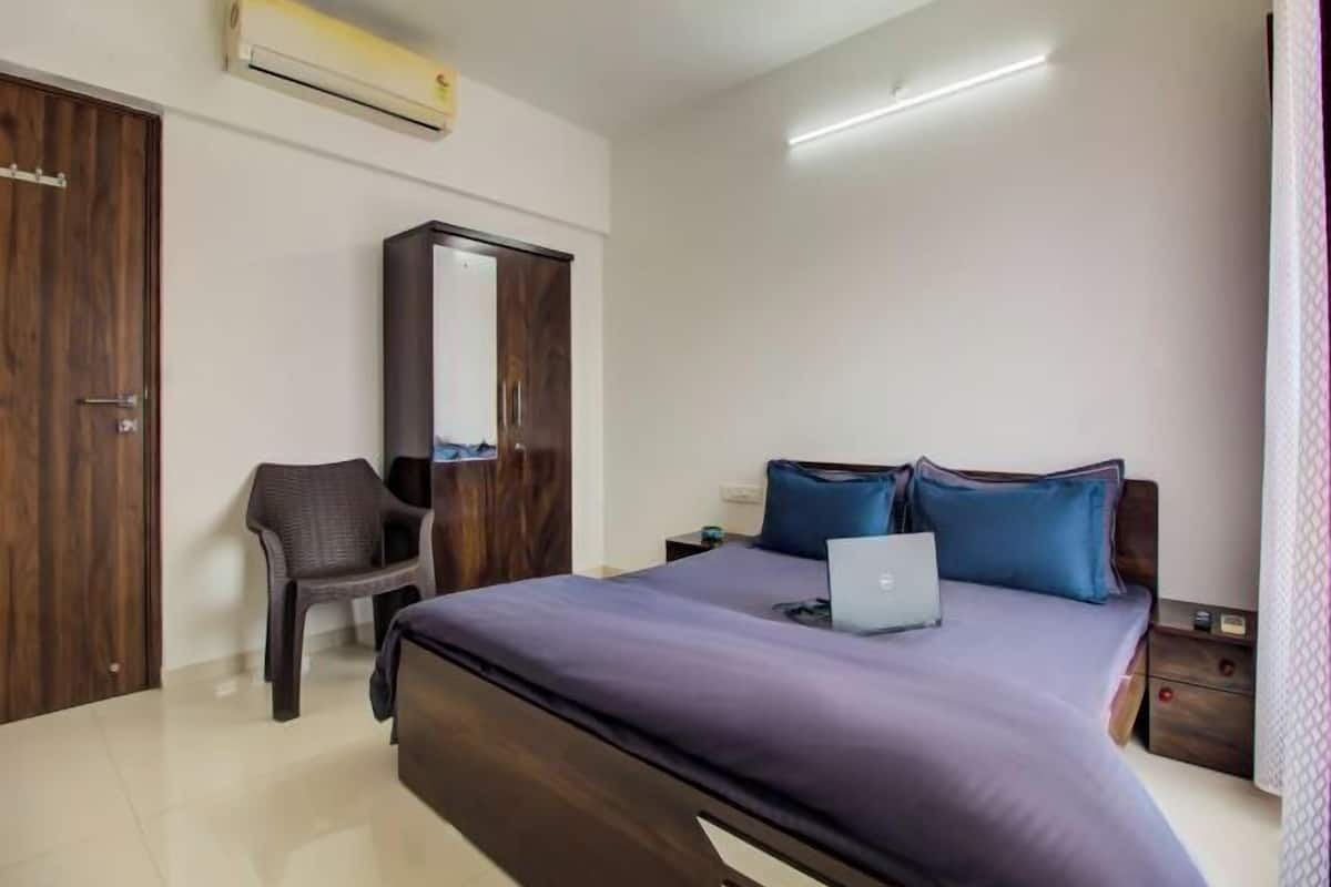 2 bedrooms, desk, blackout curtains, iron/ironing board