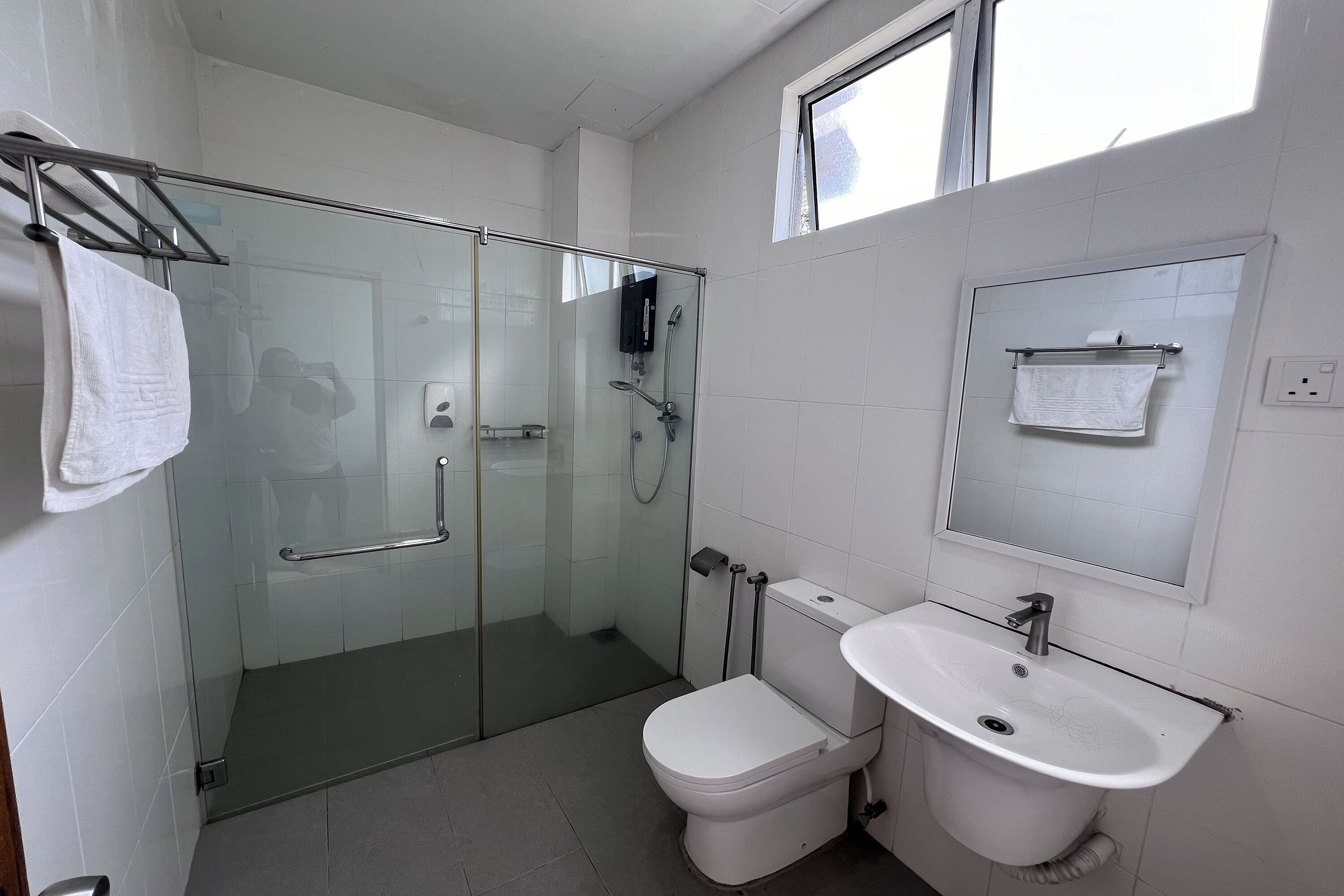 Shower, rainfall showerhead, towels