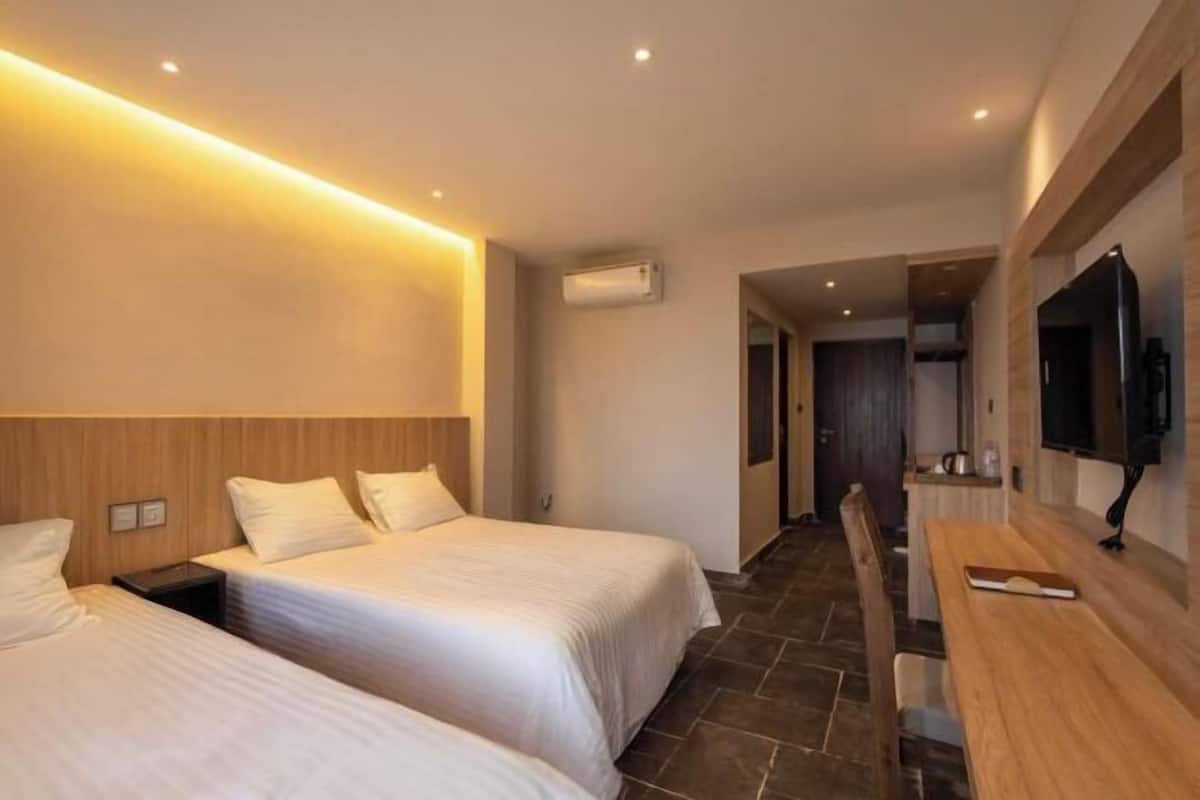 Desk, iron/ironing board (on request), WiFi (free), bed sheets