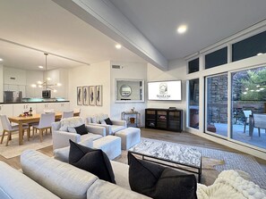 Smart TV, fireplace, books