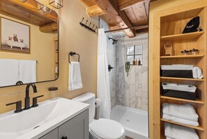 Shower, hair dryer, towels, soap