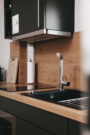 Fridge, microwave, stovetop, coffee/tea maker