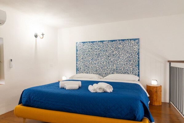 1 dormitorio, tabla de planchar con plancha, wifi y ropa de cama