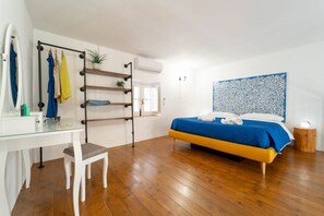 1 slaapkamer, een strijkplank/strijkijzer, wifi, beddengoed