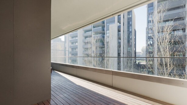 A balcony with a view of modern buildings and bare trees. - GuestHost - Modern apartment with balcony in Portello district (Milano)
