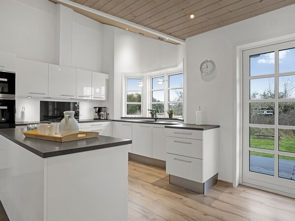 Fridge, microwave, dishwasher, cookware/dishes/utensils