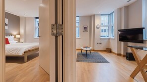 Deluxe appartement, 1 slaapkamer | Woonruimte