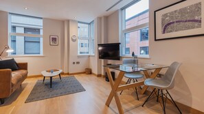 Deluxe appartement, 1 slaapkamer | Woonruimte