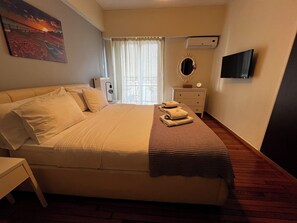 Apartment, City View | 2 bedrooms, in-room safe, soundproofing, iron/ironing board