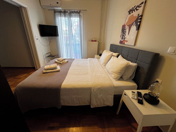Apartment, City View | 2 bedrooms, in-room safe, soundproofing, iron/ironing board