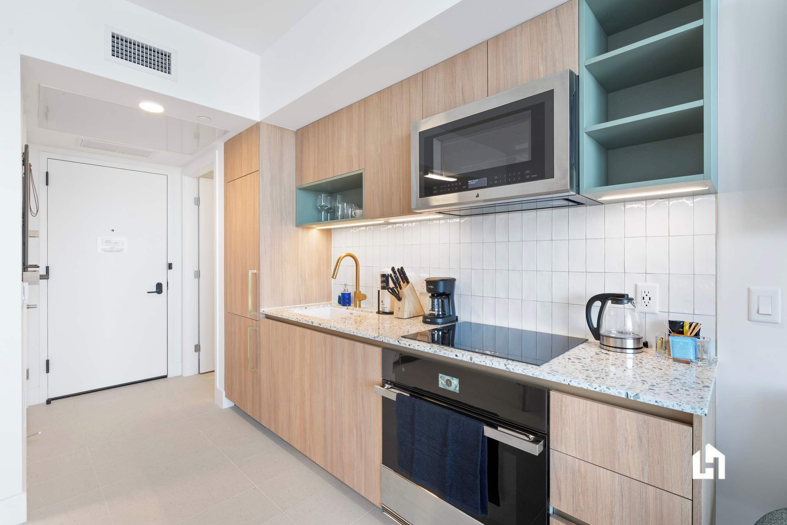 Coffee/tea maker, fridge, microwave, oven