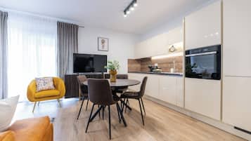 Superior Apartment, 1 Bedroom, Courtyard View | Living area | 43-inch Smart TV with digital channels