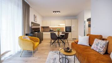 Superior Apartment, 1 Bedroom, Courtyard View | Living area | 43-inch Smart TV with digital channels