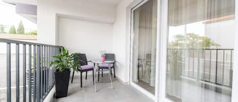 Departamento superior, 1 habitación, vista al patio | Terraza o patio