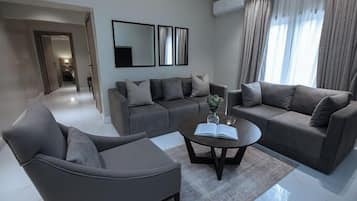 Deluxe Apartment, Balcony, City View | Living area