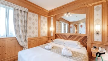 Minibar, caja de seguridad en la habitación, escritorio y cunas