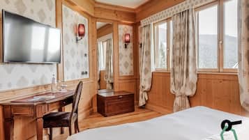 Minibar, caja de seguridad en la habitación, escritorio y cunas