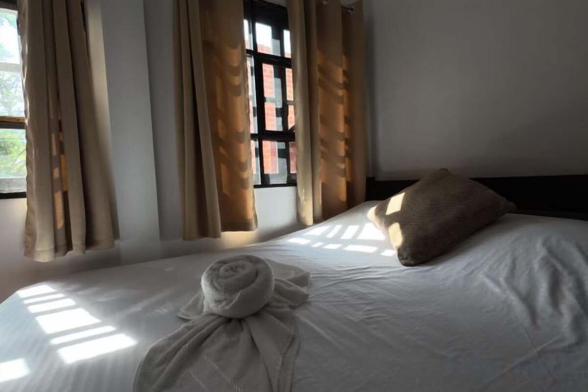 Desk, laptop workspace, free WiFi, bed sheets