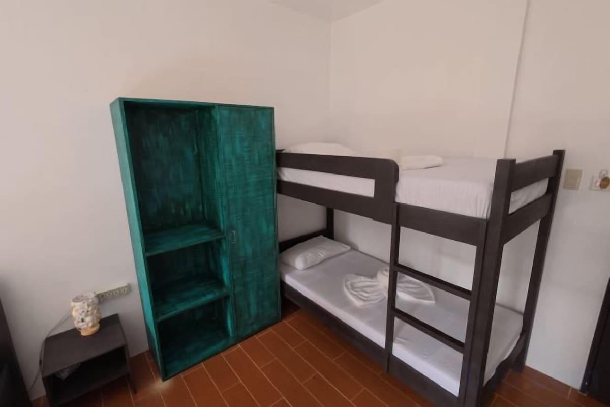 Desk, laptop workspace, free WiFi, bed sheets