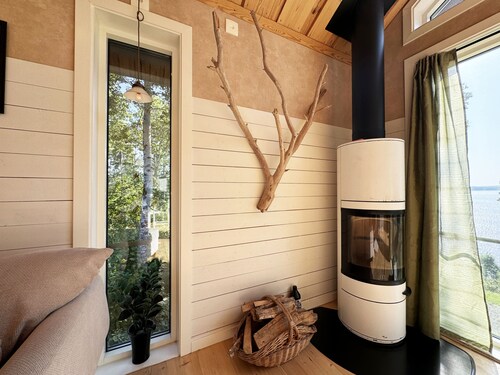 Holiday home in Dalskog with a panoramic lake view | SE17006