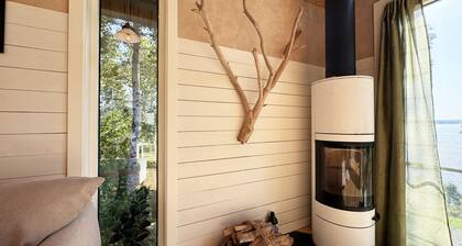 Holiday home in Dalskog with a panoramic lake view | SE17006