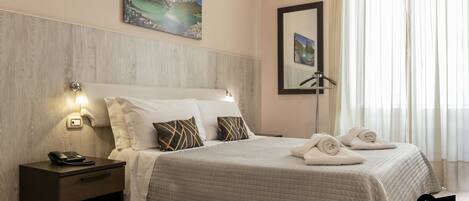 Classic Double Room | Minibar, in-room safe, desk, cribs/infant beds