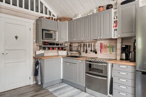 Fridge, microwave, oven, stovetop - Seaside holiday home in Axmar north of Gävle | SE20003 (Axmar)