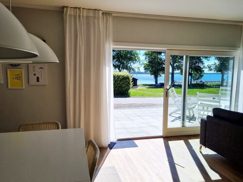 Well-equipped holiday home with a view of Lake Åsnen in Hulevik, Lönashult | SE06057