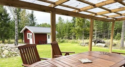 Nice holiday home by the lake Vristulven | SE08049