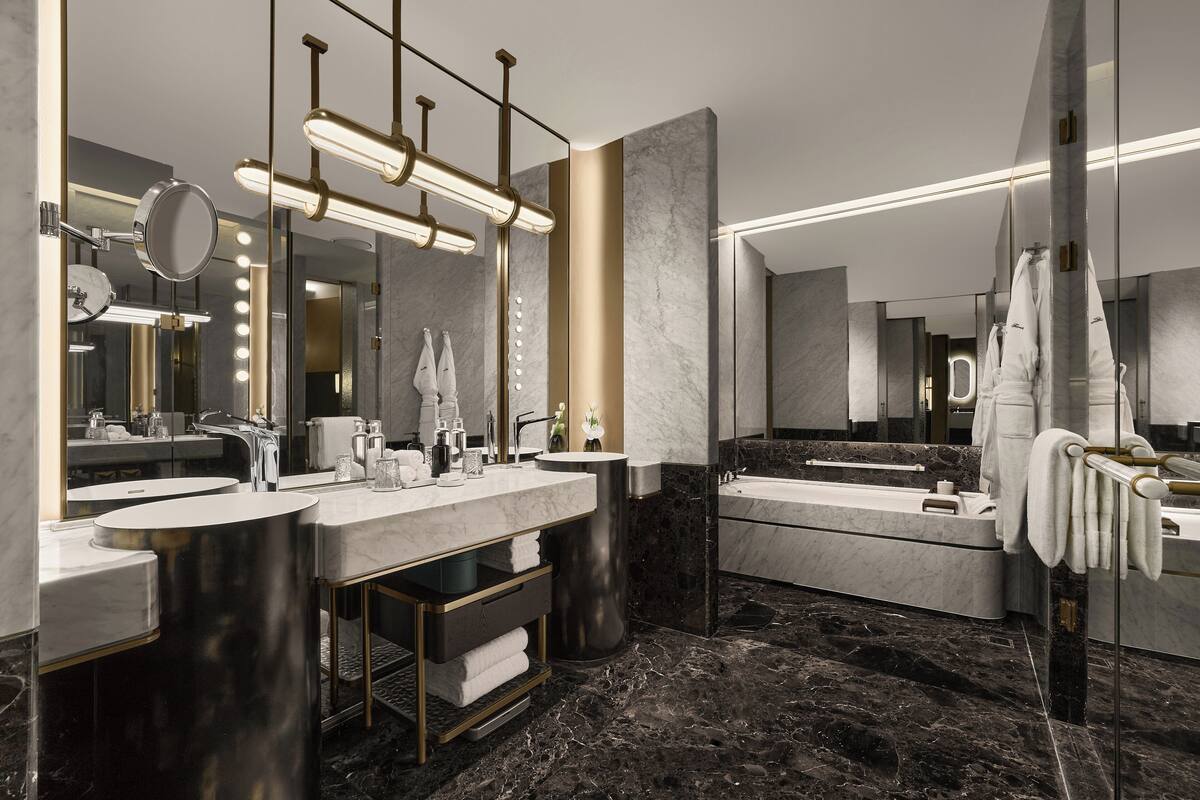 Premium bedding, down comforters, free minibar, in-room safe