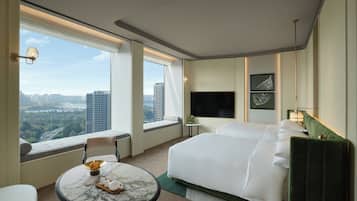 Premium bedding, down comforters, free minibar, in-room safe