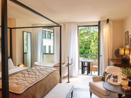 Junior Suite, 1 King Bed, Balcony, Pool View | Premium bedding, free minibar items, in-room safe, blackout drapes