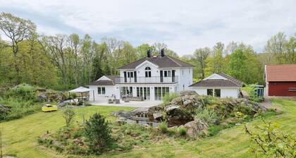 Beautiful holiday home with completely secluded location in scenic Vallda | SE02095