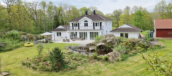 Beautiful holiday home with completely secluded location in scenic Vallda | SE02095