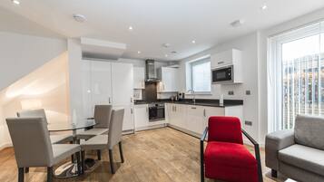 Superior Apartment, Balcony, City View | Living area