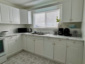 Fridge, microwave, oven, stovetop - Beautiful Modern Two Bedroom Apartment  (Brandon)