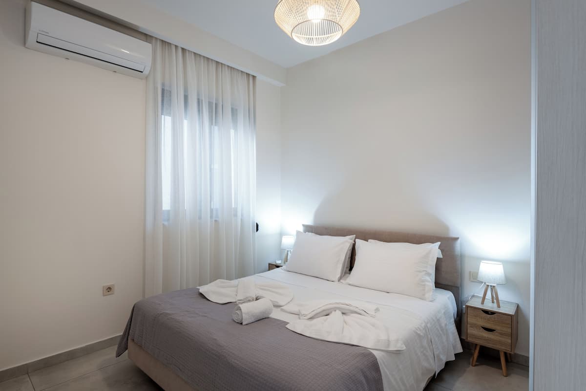 Family Apartment, Garden View | 1 bedroom, in-room safe, laptop workspace, blackout curtains