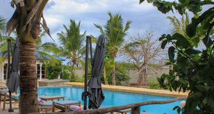 Spacious bungalow in enchanting Paje, Zanzibar with WiFi, AC, fitness room