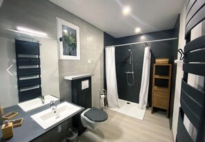 Shower, hair dryer, towels, soap