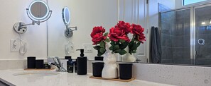 Shower, eco-friendly toiletries, hair dryer, towels