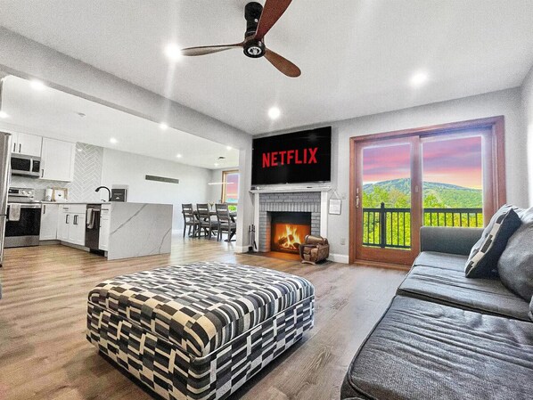 Smart TV, fireplace, foosball