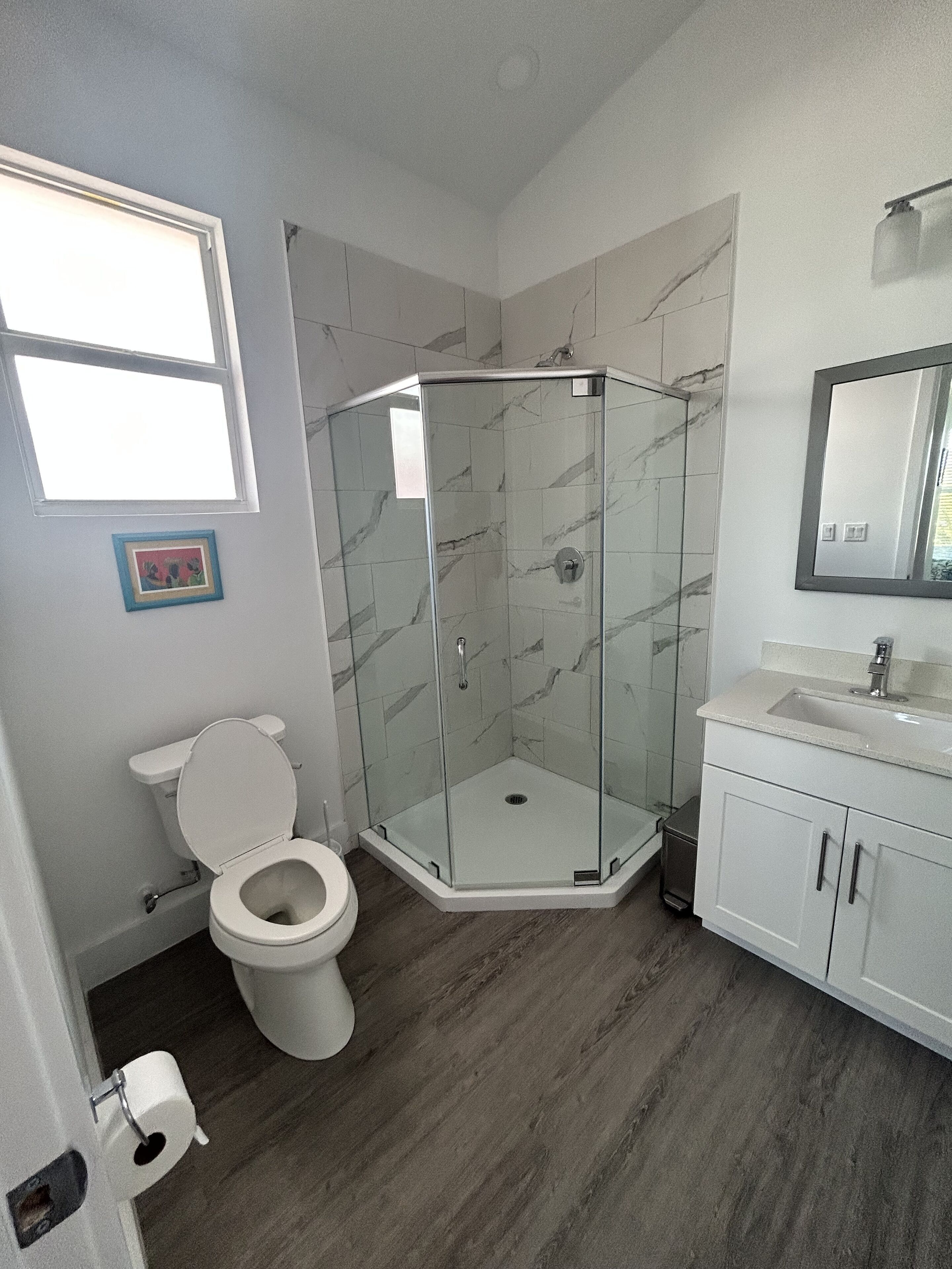 Shower, hair dryer, towels, soap
