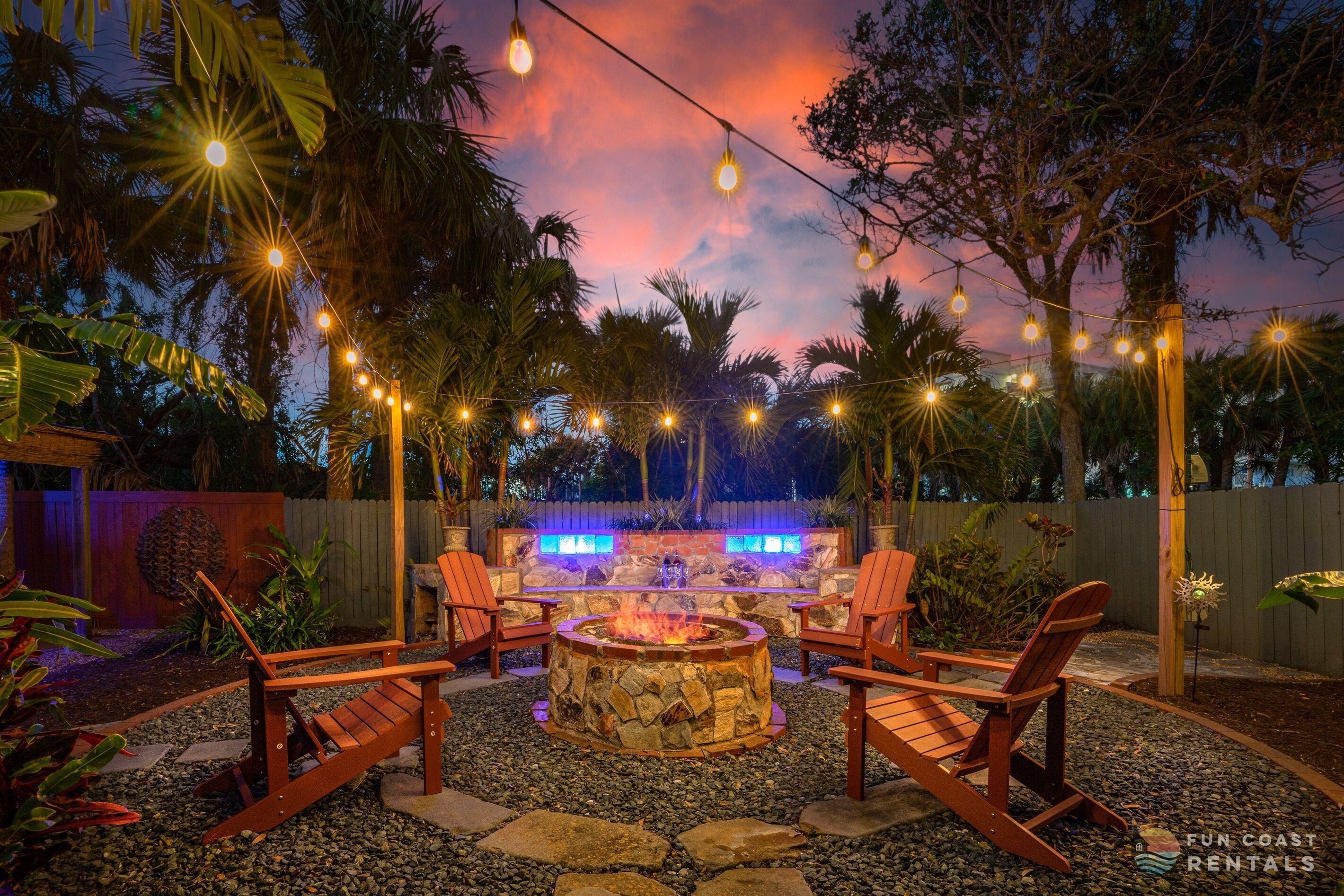 Private and inviting string lit zen Backyard with wood fire pit!