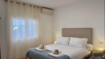 2 habitaciones, tabla de planchar con plancha, wifi y ropa de cama