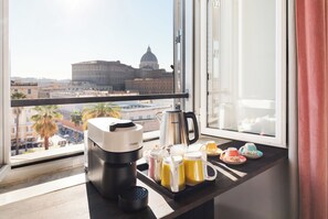 A kitchen counter with a coffee maker, a kettle, and a tray with mugs and teacups. - R.C Vatican View (Rome)