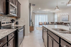 Microwave, oven, stovetop, dishwasher - Brand New 7 Bedrooms At Windsor Cay (Clermont)