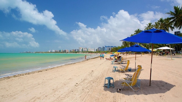 On the beach, white sand, beach shuttle, 5 beach bars