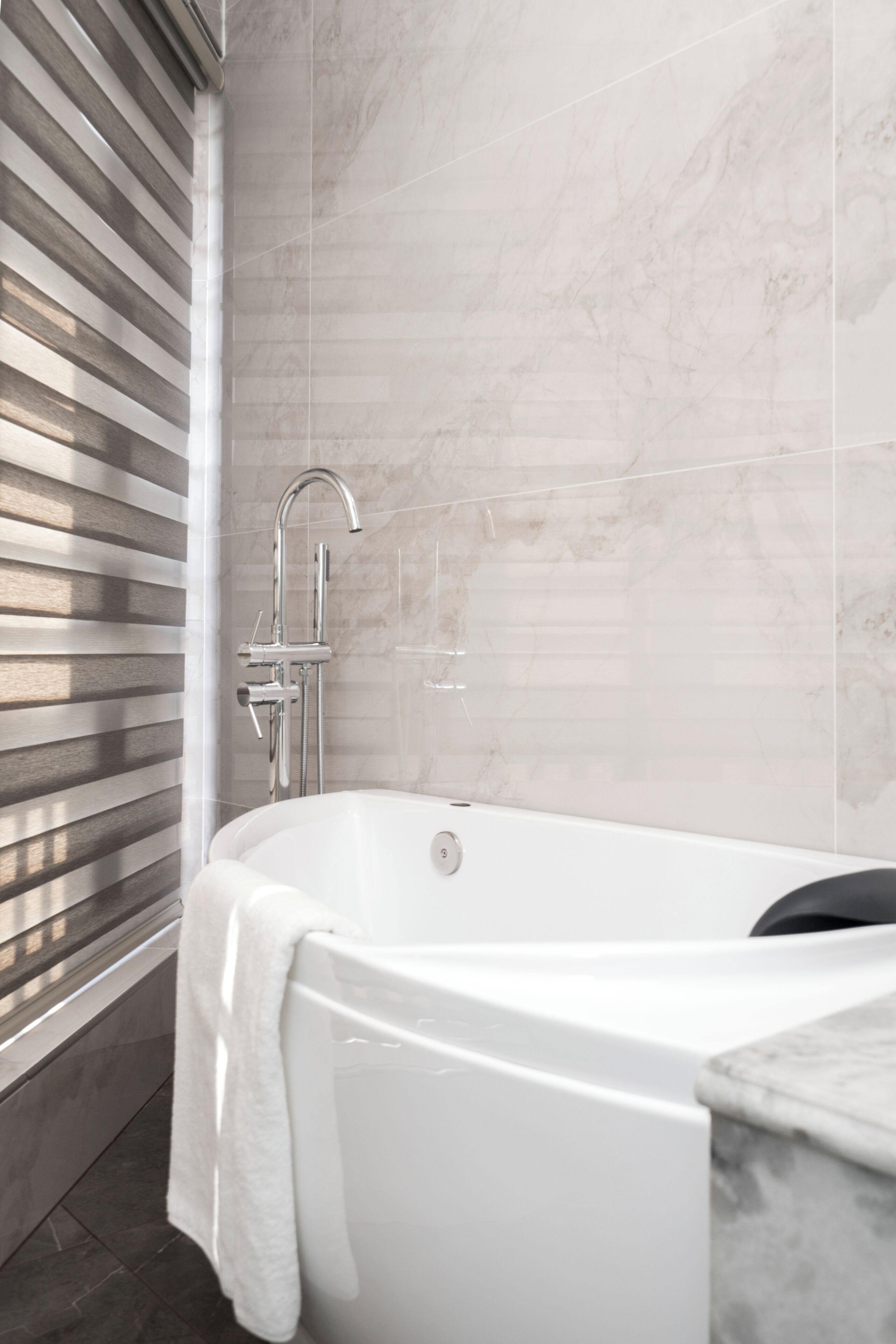 Deluxe Suite, Balcony, City View | Bathroom | Hair dryer, slippers, towels, soap