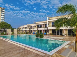 In-room safe, desk, laptop workspace, iron/ironing board - Blue Ocean Resort & Residences  (Fumba)