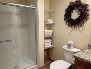 Jetted bath, hair dryer, towels, soap
